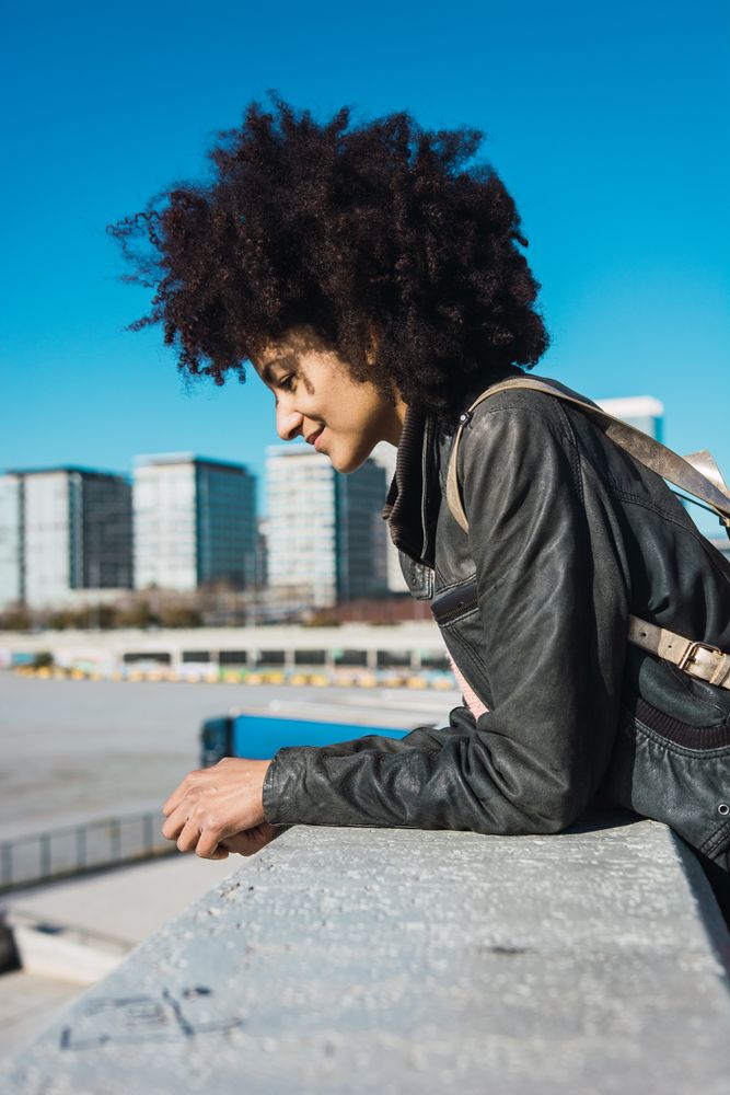 Portrait of Black woman with afro hair