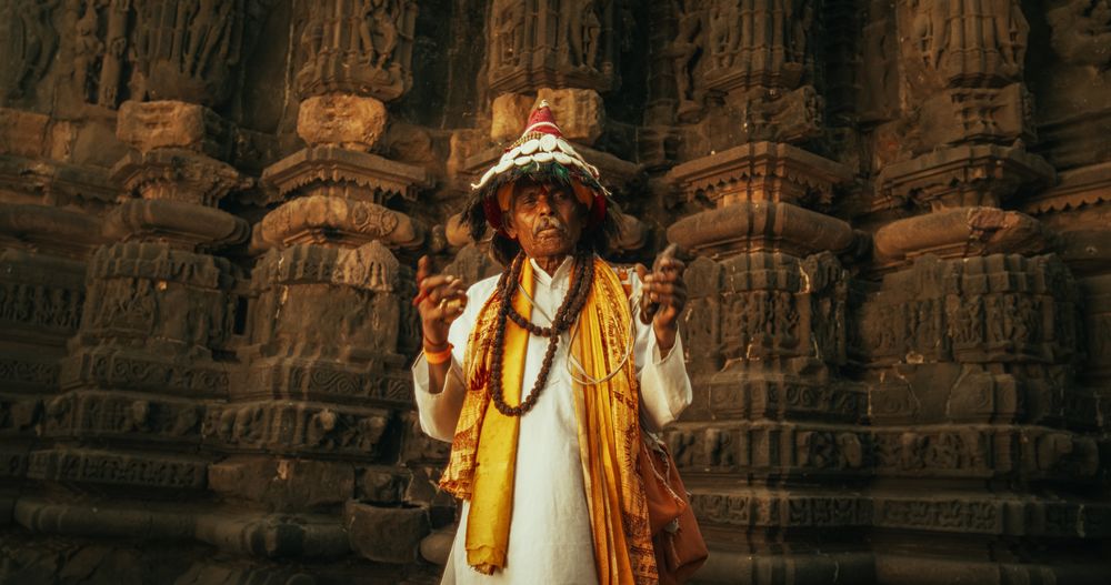 Portrait of Expressive Young Female Dancing Folk Dance Choreography in a Temple.