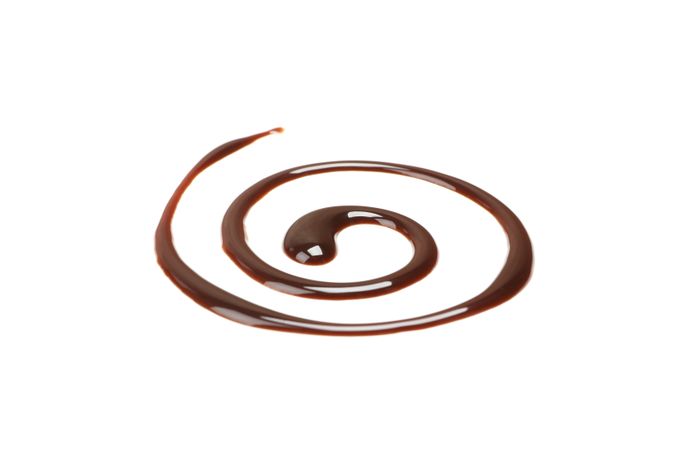 Tasty melted chocolate isolated on blank background