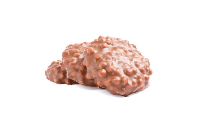 Chocolate cookies with caramel filling isolated on plain background