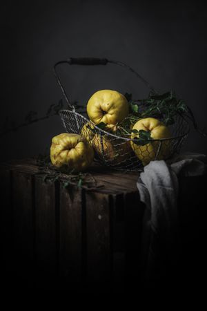 Yellow quinces in basket
