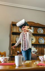 Little girl using virtual reality glasses