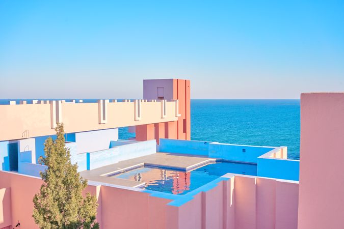 Compact pool on roof of building of geometric shapes
