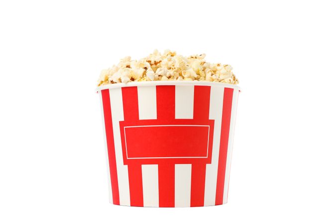 Striped bucket with popcorn isolated on blank background