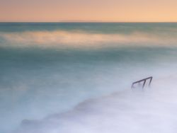 Cloudy fog over waving sea