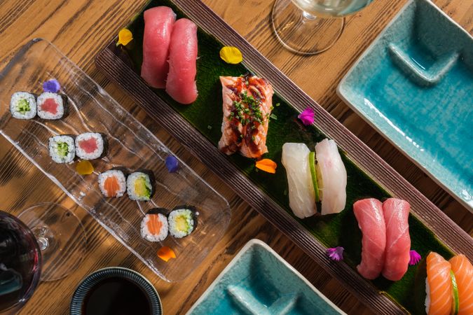 Assorted sushi with raw fish on table