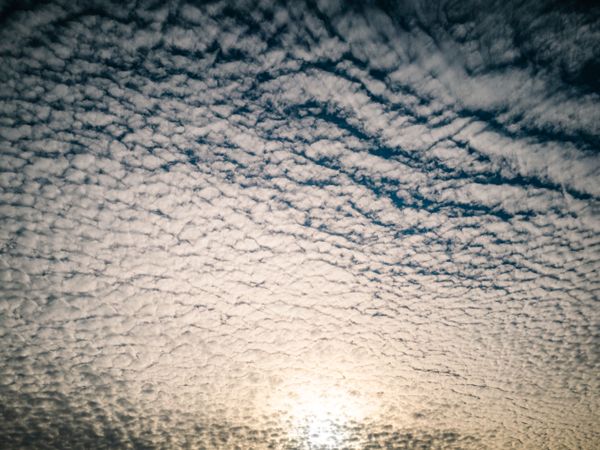 Picturesque cloudy sky at sundown