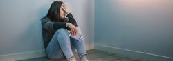 Woman holding mobile desperate for social networks problems