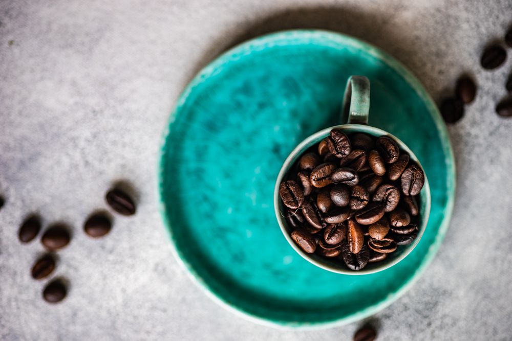 Top view of beans in teal cup
