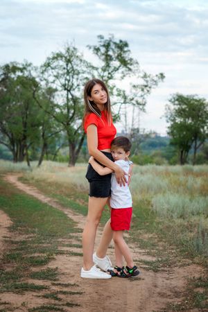 Affectionate mom with son outdoor