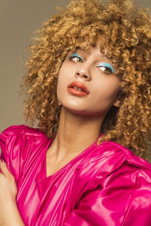 Retro woman with curly hair
