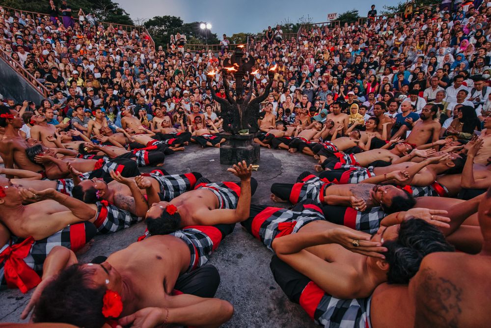 Men performing Kecak dance in Uluwatu  Bali  during sunset