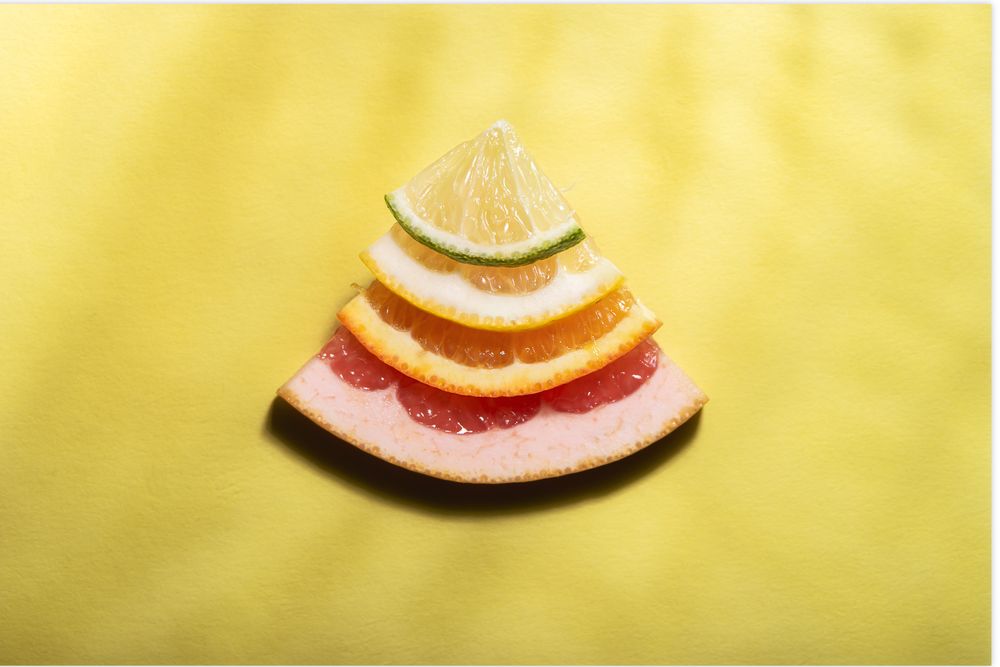 Stack of a mix of citrus fruits