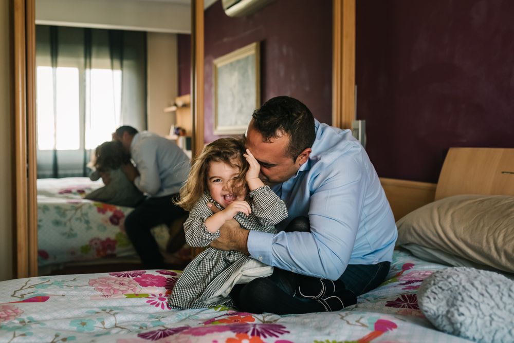 Father playing with daughter