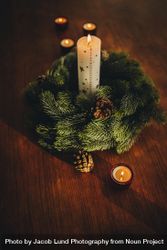 Advent wreath with burning candles on table 5wGE65