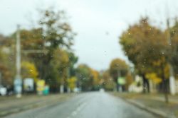 Blurred image of autumn city landscape, street