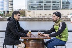 Two friends hanging out after work