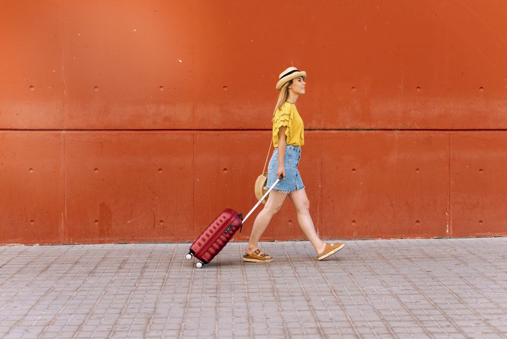 Young woman traveler going on holiday
