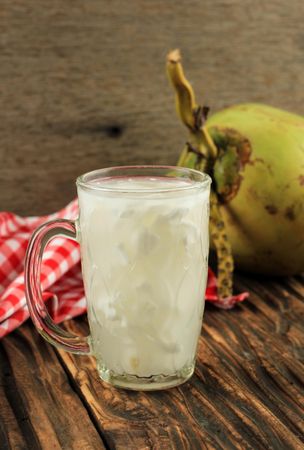 Shredded coconut with sweet syrup, served cold