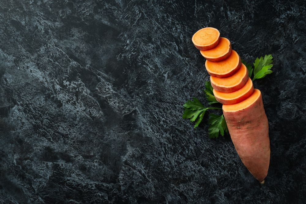 Concept of vegetables, sweet potato, space for text