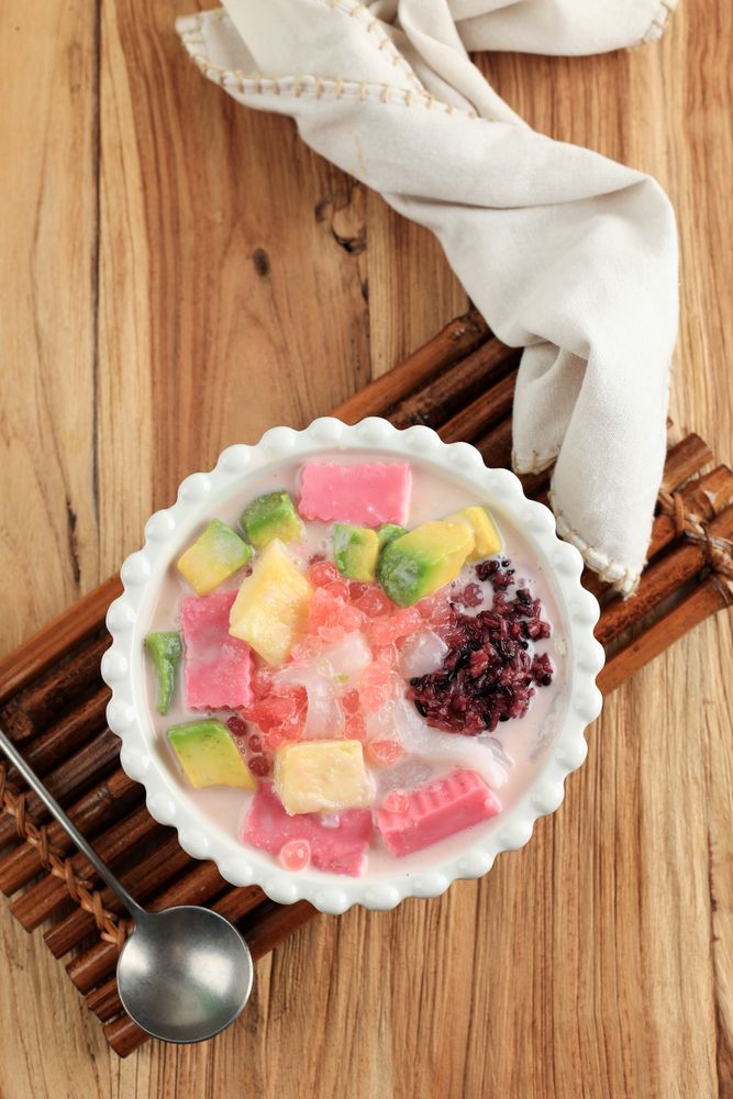 Shaved ice Asian dessert with fresh fruit served on table