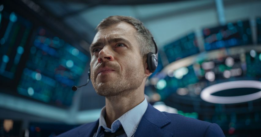 Close Up Portrait of a Smart and Thoughtful Stock Exchange Broker.