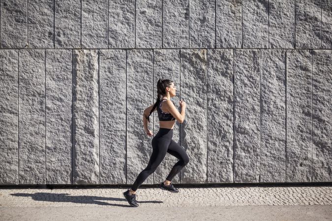 brunette woman running