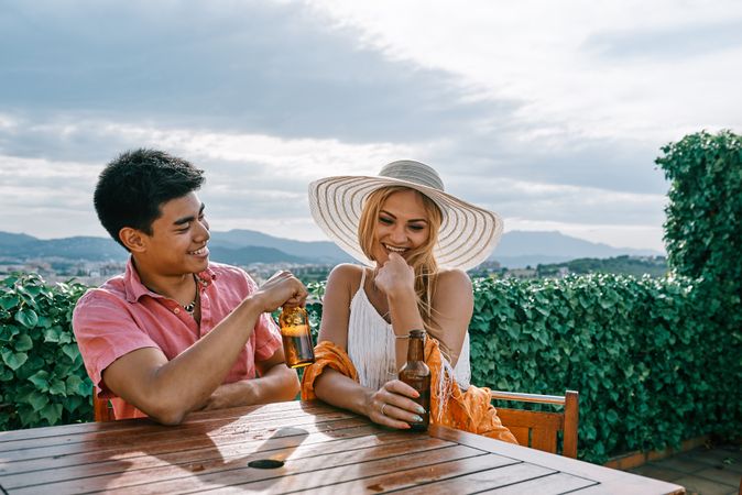 A woman and man with drinks in love