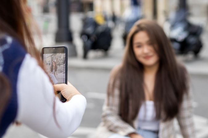 Asian Female Tourists Capturing Memories in Madrid