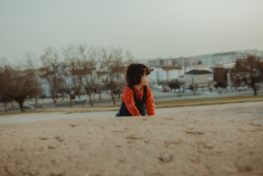 Girl climbing a small hill