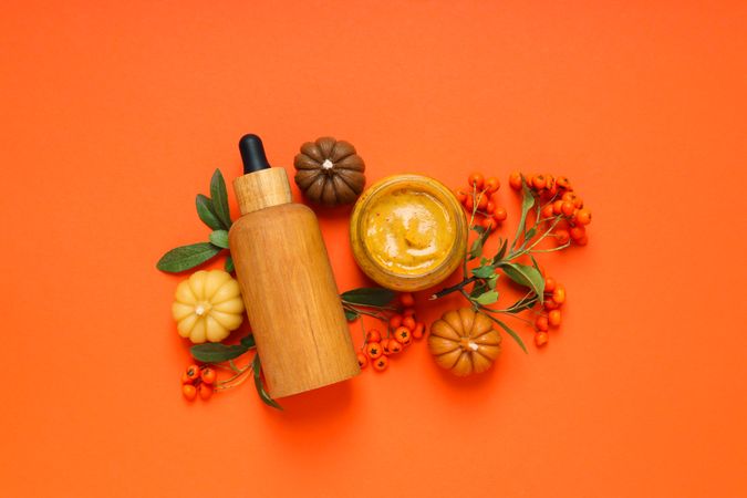 Concept of different cosmetic products, Pumpkin cosmetics, top view