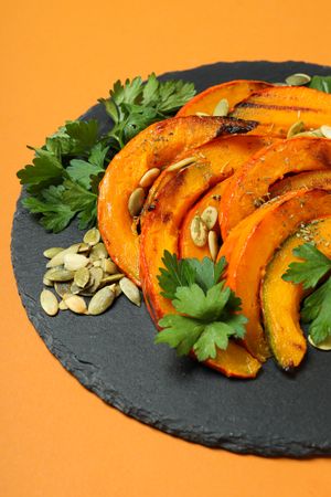 Concept of tasty homemade dish - baked pumpkin