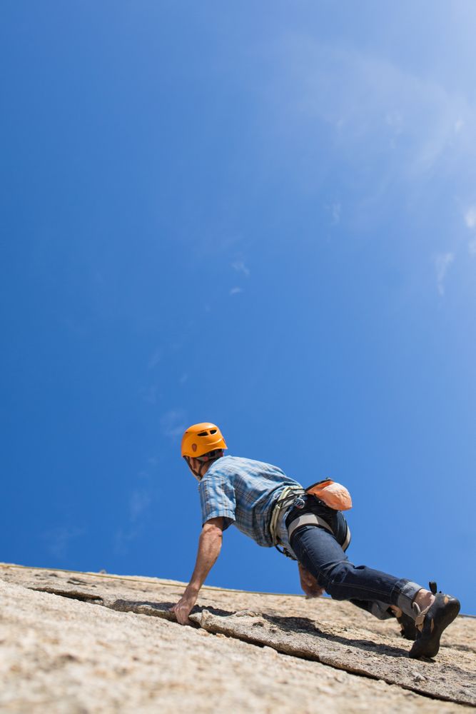 Free climber climbing in nature