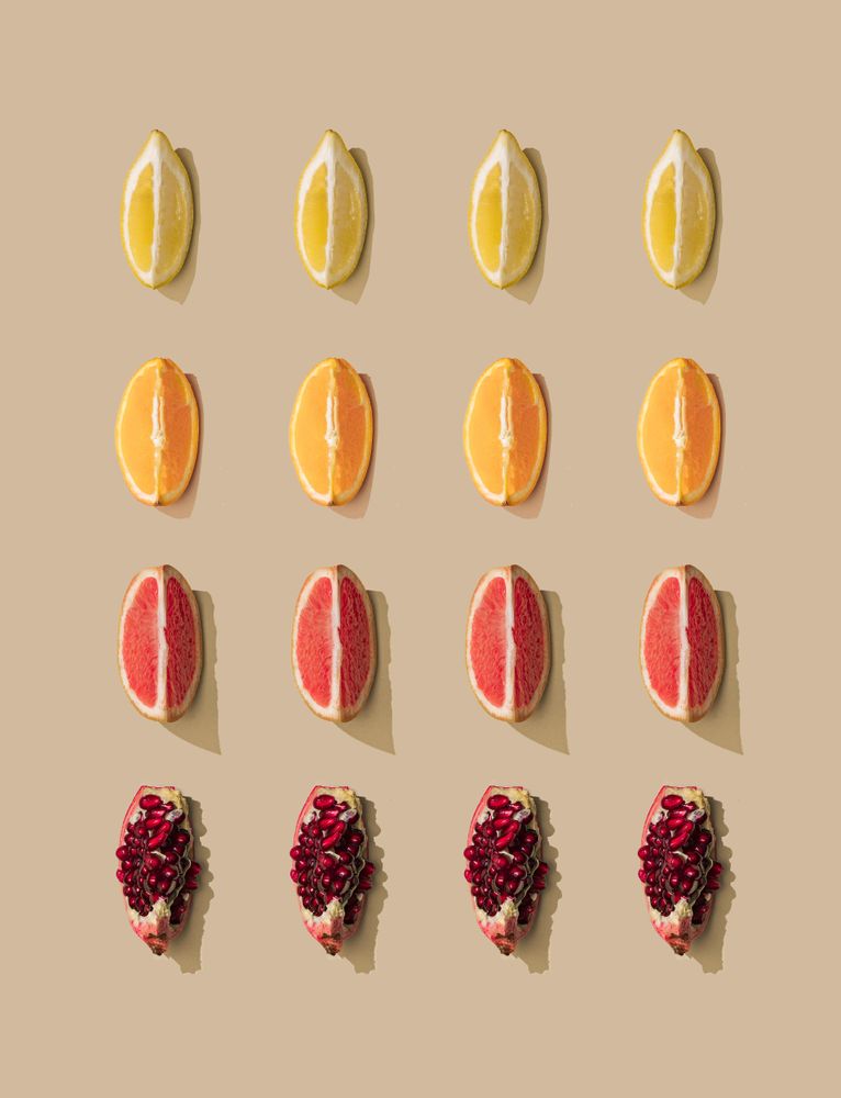 Pattern of grapefruit, orange, pomegranate and lemon slices