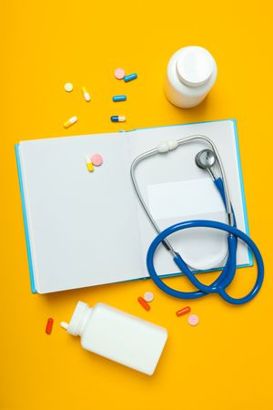 Concept of medical education and books, top view