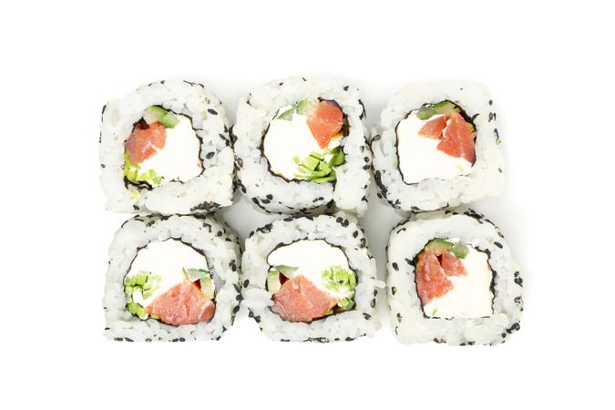 Japanese food. Delicious sushi rolls isolated on light background