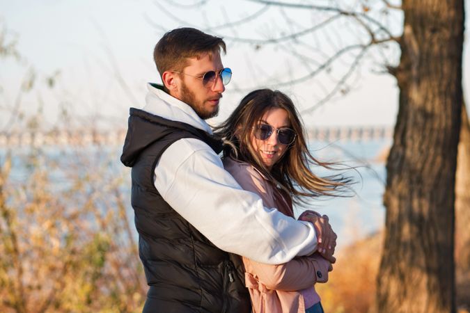 Outdoor shot young loving couple walking