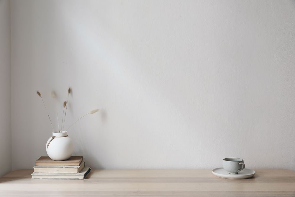 Empty beige wall background.