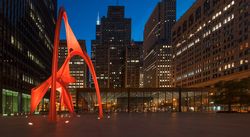 Night view of the Red Flamingo stature in the Chicago’s Federal Center Plaza A49yy4