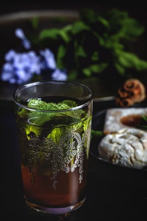 Traditional tea with mint and assorted Arab sweets