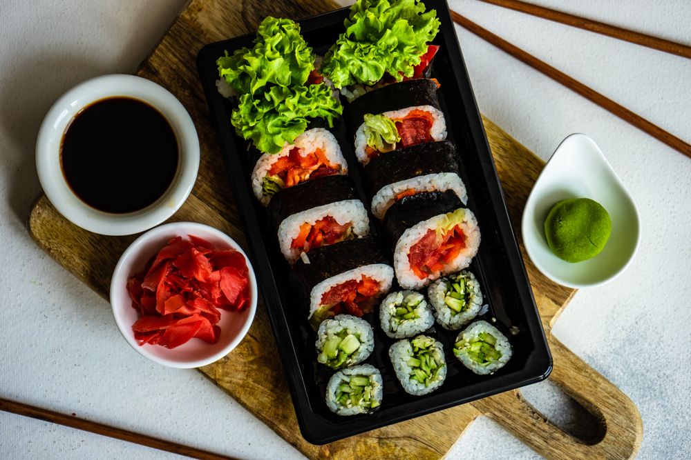 Top view of to go box of sushi and sashimi