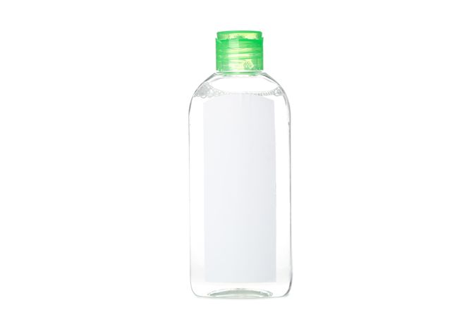 Liquid in bottle isolated on blank background