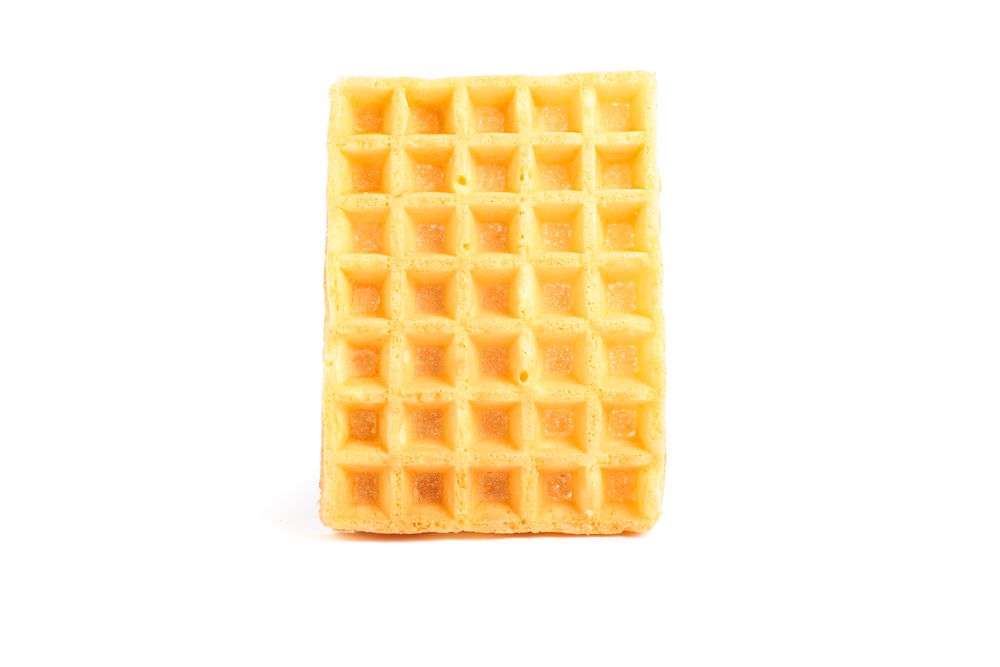 Sweet Belgian waffle isolated on blank background