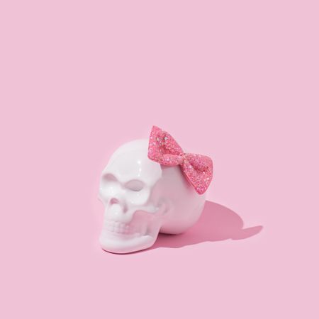 Skull with pink bow tie