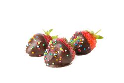 Chocolate fondue. Strawberry in chocolate isolated on blank background