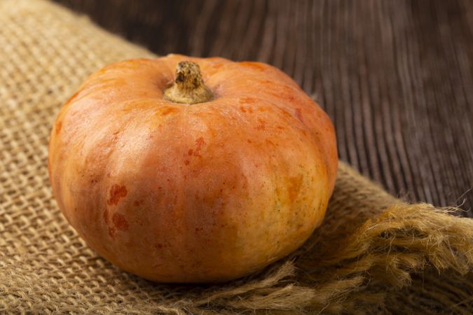 Pumpkins on the wooden table.