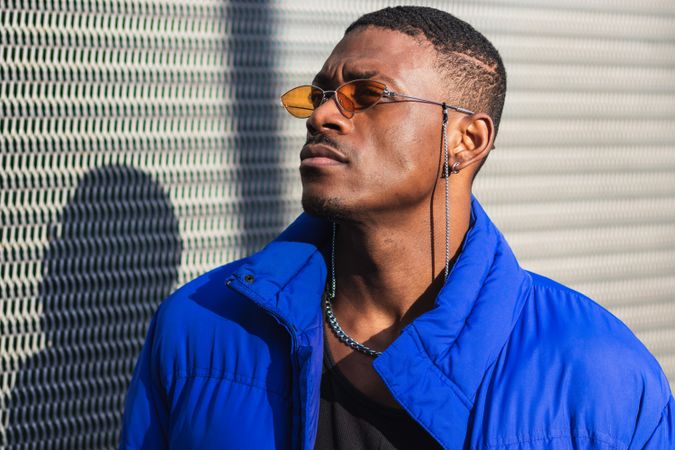 Stylish Black man in sunglasses on street