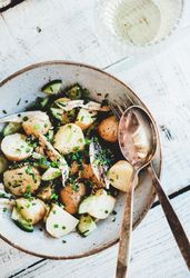 Greek style potato salad and wine, top view