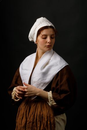 Medieval maid with closed eyes