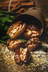 Dates fruits with walnuts, mint and cinnamon for Ramadan